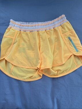 lululemon athletica Tracker 5 Yellow Layered Runner Shorts with Zip Pocket